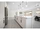 Spacious kitchen with island, stainless steel appliances, and open layout perfect for entertaining at 717 Monroe Hill Pl, Henderson, NV 89011