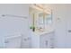 Bright bathroom showcasing a new vanity and a toilet at 7405 Saybrook Point Dr, Las Vegas, NV 89128