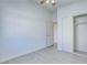 Bright bedroom featuring new flooring, a ceiling fan and closet at 7405 Saybrook Point Dr, Las Vegas, NV 89128