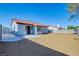 Charming home with a well-maintained yard, rock landscaping, and inviting curb appeal at 7405 Saybrook Point Dr, Las Vegas, NV 89128