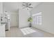 A bright and airy dining area is enhanced by natural light and neutral decor at 7405 Saybrook Point Dr, Las Vegas, NV 89128