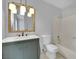 Bathroom featuring a vanity with drawers, a toilet, and a shower-tub combination at 75 N 27Th St, Las Vegas, NV 89101