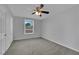 Bedroom featuring carpeted floor and a window for natural light at 75 N 27Th St, Las Vegas, NV 89101