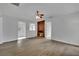 Living room with wood flooring, ceiling fan and brick fireplace at 75 N 27Th St, Las Vegas, NV 89101