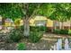 Inviting home with mature trees, shade, and a classic picket fence at 1115 Melville Dr, Las Vegas, NV 89102