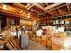 Cluttered garage interior showcasing open wood frame rafters and plenty of storage space at 1115 Melville Dr, Las Vegas, NV 89102