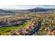 Beautiful aerial view of a Las Vegas neighborhood, with a golf course and desert landscape at 1223 Casa Palermo Circle Cir, Henderson, NV 89011