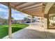 Covered patio with scenic views of the pool, backyard, and surrounding mountain landscape at 1223 Casa Palermo Circle Cir, Henderson, NV 89011