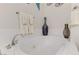 Modern bathroom featuring sleek white bathtub with chrome faucet and jets and neutral decor at 1223 Casa Palermo Circle Cir, Henderson, NV 89011
