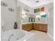 Bright bathroom featuring soaking tub, double vanities, glass block shower, and modern fixtures at 1223 Casa Palermo Circle Cir, Henderson, NV 89011