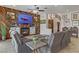Cozy living area with fireplace, TV, and comfortable seating, perfect for relaxing or entertaining guests at 1223 Casa Palermo Circle Cir, Henderson, NV 89011