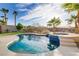Inviting pool and spa area surrounded by beautiful landscaping and picturesque desert views at 1223 Casa Palermo Circle Cir, Henderson, NV 89011