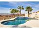 Beautiful pool with an attached spa, mature palms, and desert views at 1223 Casa Palermo Circle Cir, Henderson, NV 89011