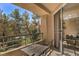 Inviting outdoor balcony offering a tranquil setting with views of lush greenery at 230 E Flamingo Rd # 203, Las Vegas, NV 89169