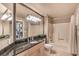 Well-lit bathroom with a large mirror, vanity, and a shower-tub combination at 230 E Flamingo Rd # 203, Las Vegas, NV 89169