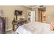 Inviting bedroom with neutral tones, a desk area, and easy access to other areas of the home at 230 E Flamingo Rd # 203, Las Vegas, NV 89169