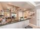 Bright kitchen features stainless steel appliances, a breakfast bar, and ample cabinet space at 230 E Flamingo Rd # 203, Las Vegas, NV 89169
