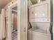 Convenient laundry area with a stacked washer and dryer unit at 230 E Flamingo Rd # 203, Las Vegas, NV 89169