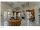 Luxurious living room features a fireplace, cozy seating, and ample natural light, creating an inviting atmosphere at 230 E Flamingo Rd # 203, Las Vegas, NV 89169