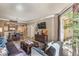 Open-concept living area with dining space, and balcony access at 230 E Flamingo Rd # 203, Las Vegas, NV 89169
