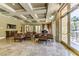 Comfortable lounge with plush seating, piano, marble floors, modern lighting and entertainment center at 230 E Flamingo Rd # 203, Las Vegas, NV 89169