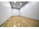 Spacious racquetball court with hardwood floors, bright lighting, and ample room for competitive play at 230 E Flamingo Rd # 203, Las Vegas, NV 89169