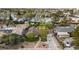 Overhead view of a home with well-maintained landscaping, mature trees, and a paved walkway to the entrance at 2400 Llewellyn Dr, Las Vegas, NV 89102