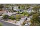 Beautiful aerial view of a home in a tree-lined neighborhood with mature landscaping and a long driveway at 2400 Llewellyn Dr, Las Vegas, NV 89102