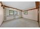 Spacious room with built-in shelving, large windows, and hardwood accents at 2400 Llewellyn Dr, Las Vegas, NV 89102