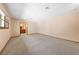 Large bedroom with wall to wall carpeting leading into an attached bathroom at 2400 Llewellyn Dr, Las Vegas, NV 89102