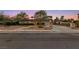 Charming home with a manicured front yard and a long driveway at 2400 Llewellyn Dr, Las Vegas, NV 89102