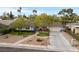 Charming single-story home featuring well-maintained landscaping and a spacious driveway at 2400 Llewellyn Dr, Las Vegas, NV 89102