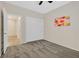 Comfortable bedroom with neutral carpet and a closet with white bi-fold doors at 2839 Goldcreek St, Henderson, NV 89052