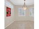 Bright breakfast nook featuring tile flooring, decorative lighting and plantation shutters at 2839 Goldcreek St, Henderson, NV 89052