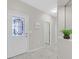 Entryway with decorative glass door, tile flooring and neutral paint at 2839 Goldcreek St, Henderson, NV 89052
