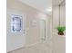 Inviting entryway with decorative glass door, tiled floor, and 'Welcome Home' decor at 2839 Goldcreek St, Henderson, NV 89052