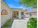 Inviting front porch with seating area, decorative accents, and manicured landscaping at 2839 Goldcreek St, Henderson, NV 89052