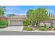 Charming single-story home with a well-manicured front yard and a two-car garage at 2839 Goldcreek St, Henderson, NV 89052