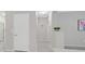 Hallway with neutral paint, tile flooring, and decorative accents at 2839 Goldcreek St, Henderson, NV 89052