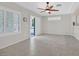 Open living room space with recessed lighting, tile flooring, and plantation shutters on the windows at 2839 Goldcreek St, Henderson, NV 89052
