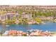 Panoramic view of a lakefront with complex featuring lush landscaping and European architecture at 29 Montelago Blvd # 131, Henderson, NV 89011