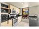 Bright kitchen with stainless steel appliances and a large window with a view at 29 Montelago Blvd # 131, Henderson, NV 89011
