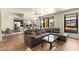 Bright, open living room and kitchen with mountain views, perfect for entertaining and everyday living at 29 Montelago Blvd # 131, Henderson, NV 89011