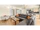 Spacious open concept living room and kitchen with hardwood floors and lots of natural light at 29 Montelago Blvd # 131, Henderson, NV 89011