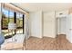 Bright office space with laminate flooring, and large windows with a peaceful outdoor view at 29 Montelago Blvd # 131, Henderson, NV 89011