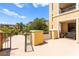 Inviting patio with lush landscaping, and decorative gate at 29 Montelago Blvd # 131, Henderson, NV 89011