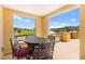 Inviting outdoor dining area on a patio with scenic views of the mountains and lake at 29 Montelago Blvd # 131, Henderson, NV 89011