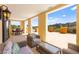 Expansive patio area featuring wicker furniture, perfect for relaxing and enjoying the beautiful scenery at 29 Montelago Blvd # 131, Henderson, NV 89011
