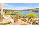 Expansive lake view with serene water, surrounding greenery, and a clear sky, perfect for relaxation at 29 Montelago Blvd # 131, Henderson, NV 89011