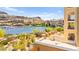 Beautiful lakefront view highlighting a resort-style community with European inspired architecture and lush landscaping at 29 Montelago Blvd # 131, Henderson, NV 89011